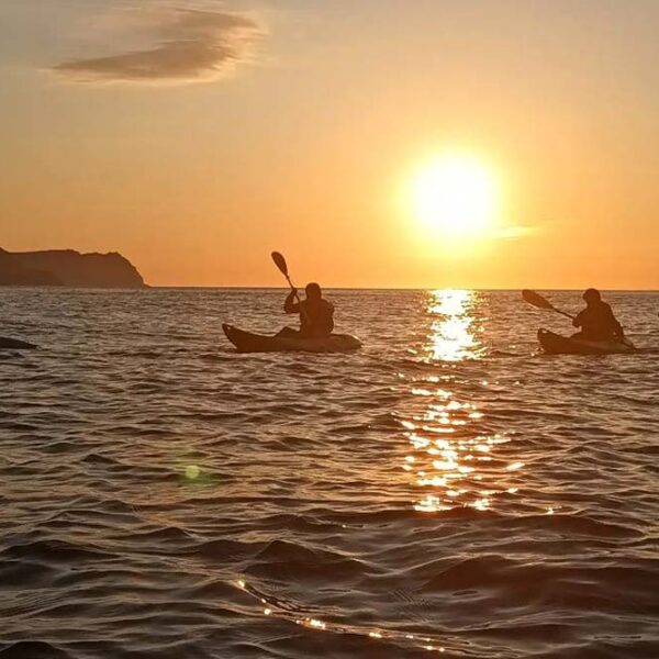 Kayakers in Downings Bay Sunset